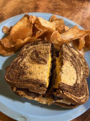 The Buzz Cafe delicious Patty Melt with homemade potato chips