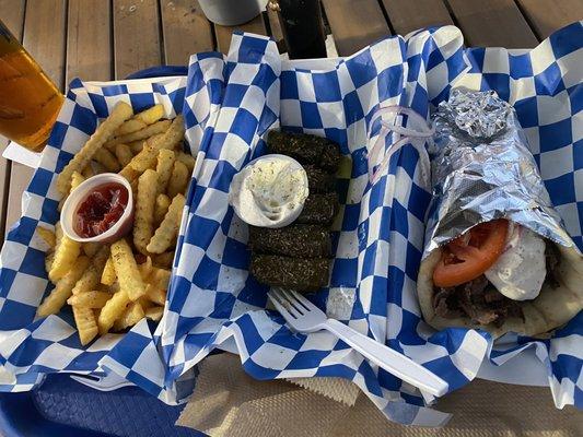 Lamb gyro, grape leaves and a side of plain fries