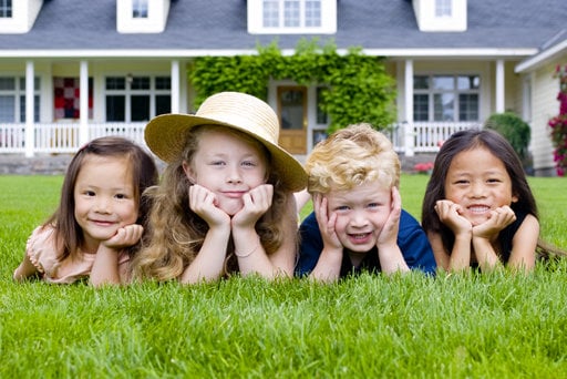 Kids on a protected and harmless lawn - Kinder Spray