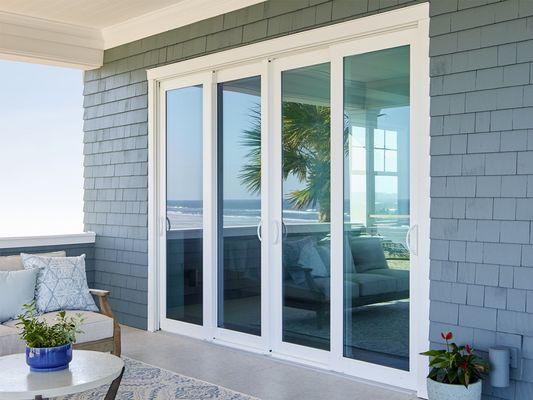 Seamless transitions: Our vinyl sliding glass door combines elegance with functionality, letting natural light flood your space