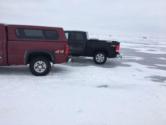 Trucks on the lake.