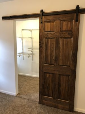 Sliding barn doors with wire ack closet organizer