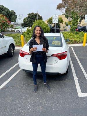 Happy student with her license on first try!