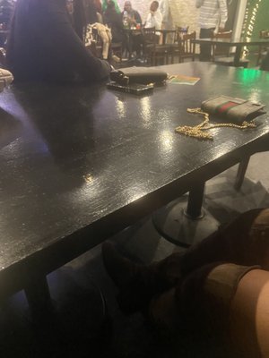 The empty table of 7 ppl that waited over 20 minutes to be  served