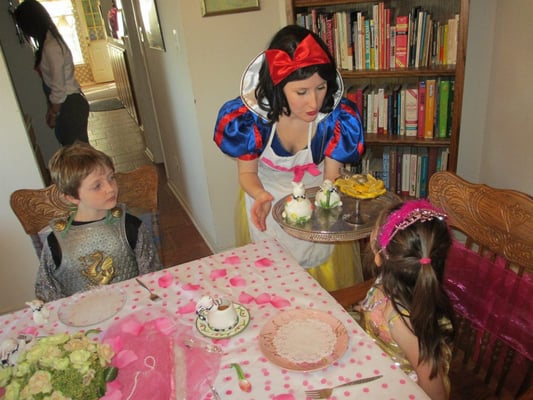 Snow White serving tea during the tea party