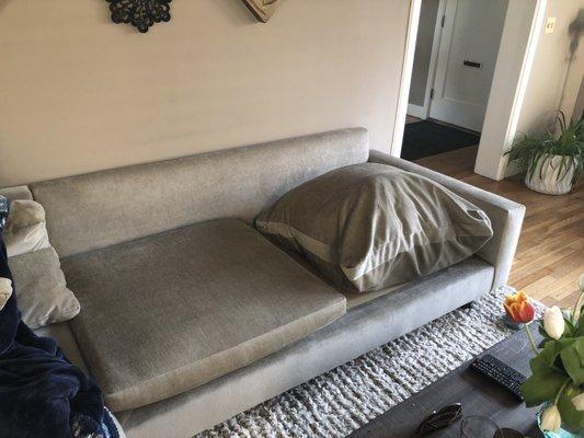 Couch cushion on the right has been destroyed by Baryames Cleaners and they will not replace it.