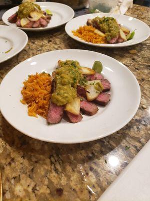 Japanese Wagyu meat and potatoes with green salsa and a Mexican rica