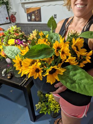 Bucket of sunflowers on harvest Day.