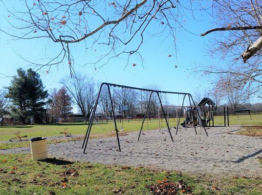 swings and another playground by the ballfields