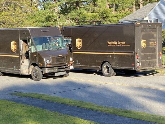 2 ups trucks blocking our dead end street to shoot the shit. No one could get down the street no one could leave.