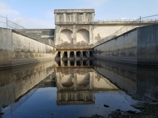 Jump off the trail and get real close to the Olmos Dam