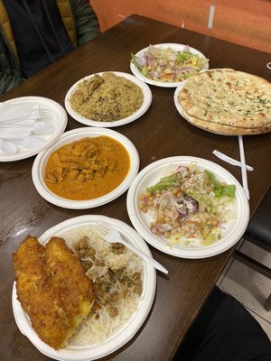 Butter chicken, nahh, salad, fried tilapia