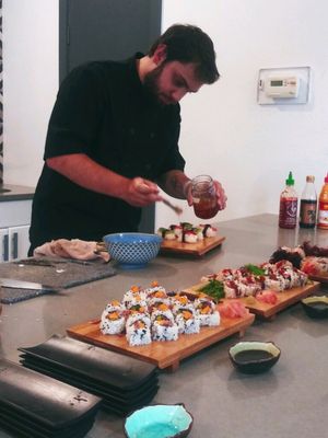 Chef Charles garnishing Fruit Nigiri dessert