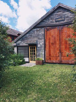 The outside of the Charym studio, set in a beautiful cottage garden