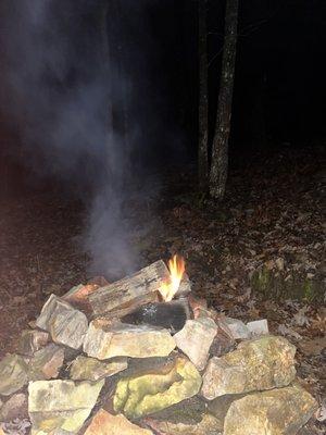 The fire pit behind our cabin