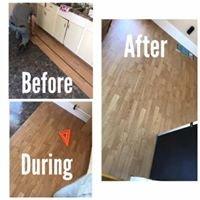 laminate flooring being installed in small kitchen