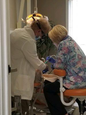 Dr. Walker and Kathy working together to create another beautiful smile!