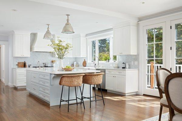 High end kitchen remodel completed with new flooring.