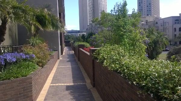 The complex has two buildings (750 and 850). The brick courtyard and walkways have beautiful brick planters and water features.