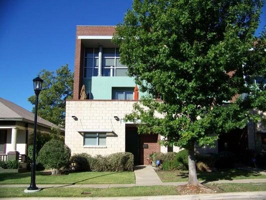 For Lease! Stunning Tri-Level town home in the heart of the Southside! 2 car garage. Concrete & wood floors. 2 balconies. 