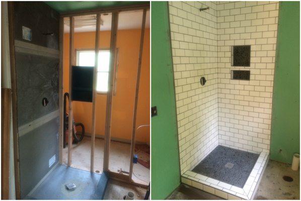 Brand new shower with white subway tile and stone mosaic floor.