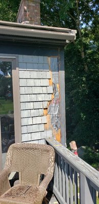 Damaged side wall shingle repair.