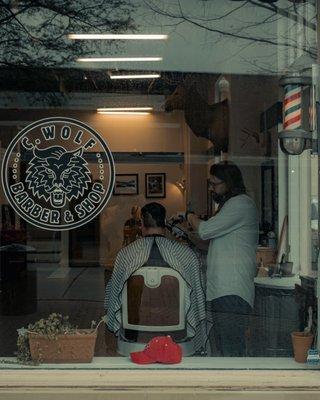 C. Wolf Barber & Shop