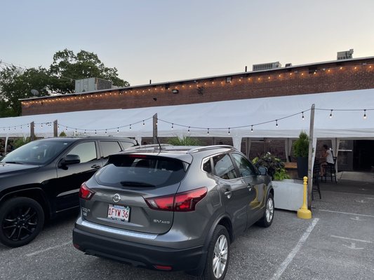 Parking lot next to the outdoor seating area