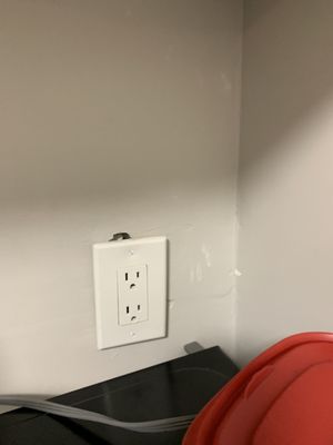 Paint missing, outlets uneven, its like this all over.