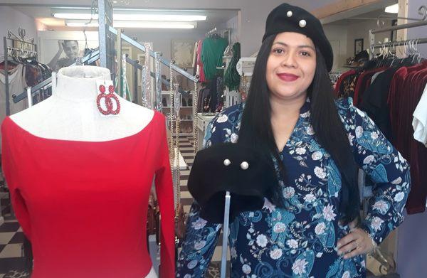 Off shoulder red top with gorgeous earrings to go with and a beautiful beret hat. Beautiful for the season, great prices...