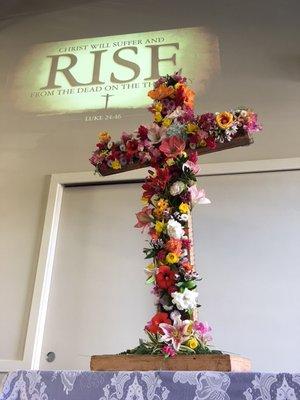 An Easter tradition of a floral cross.