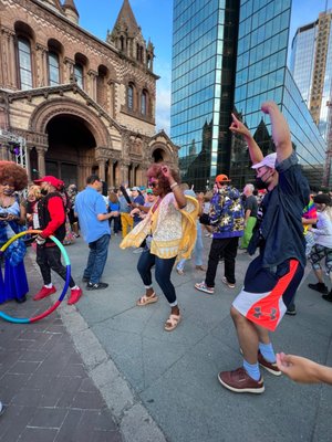 Lots of People were dressed up in vintage 70's Clothing @ The Free Annual Donna Summer Disco Party in Copley Square in Boston 2022.