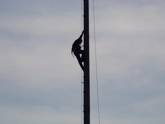 Repairing football field tower lights