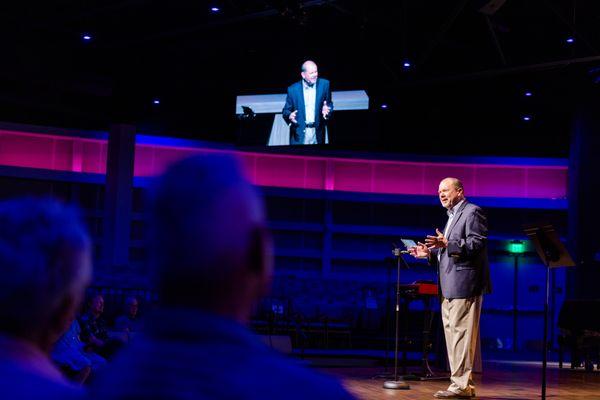 Pastor Ron at a Contemporary Service in the Worship Center.