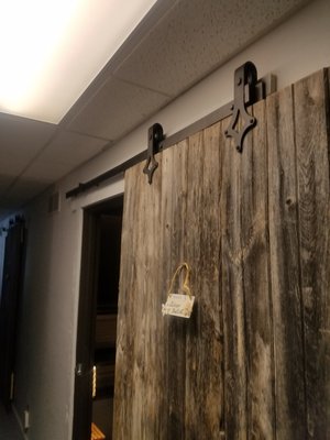 1900's Track Barn Doors for Room doors. Nice Touch!