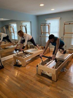 Small group reformer class on classical equipment.