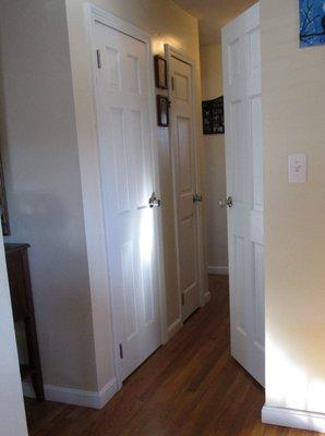 Hallway Doors after painting them in white!