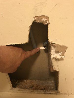 Installed fridge water wrong place, poked thru wall, cut sheet rock flush to trim.