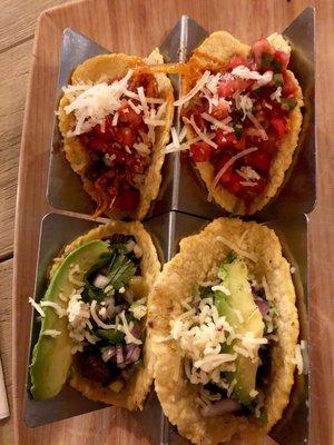 Everyday tacos on top with turkey picadillo, and Barrio tacos on bottom with carne asada.