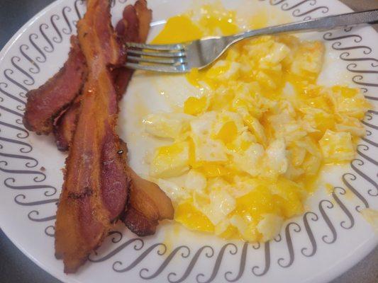 2 Eggs side of well done bacon