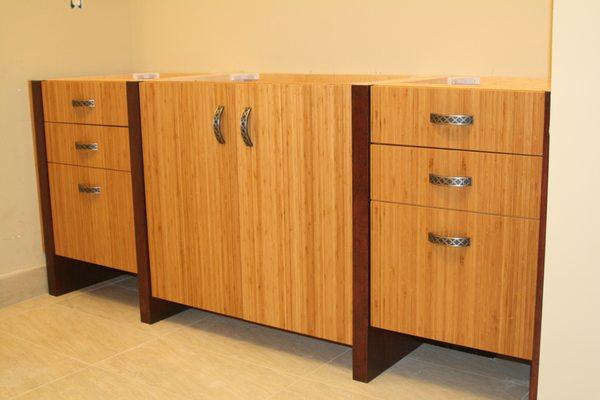 unusual bamboo faced vanity with cherry wood accents