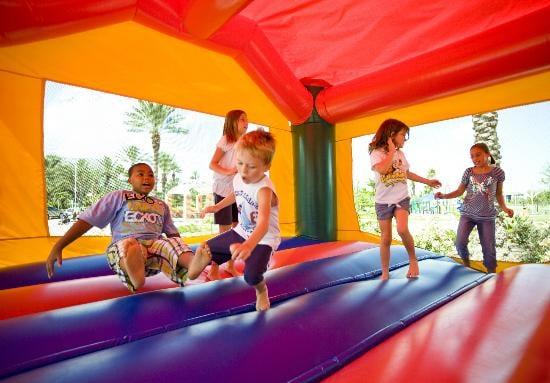 Inside the bounce zone. Happy bouncers at one of our famous birthday parties.