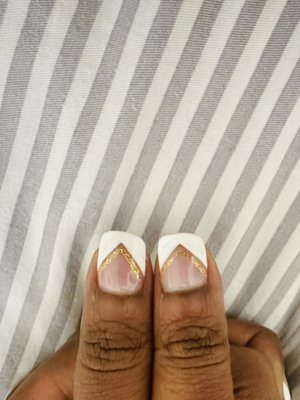 The left hand nails are slanted compared to the right