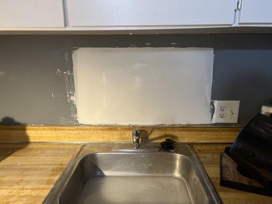 Behind sink faucet patch