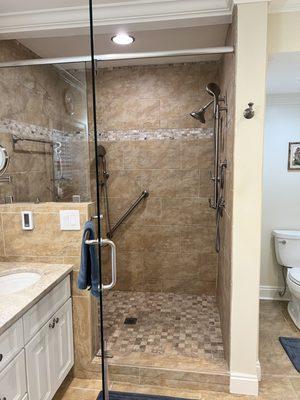 Complete 1940 ranch transformation -  master bath. Shower tile and fixture installation.