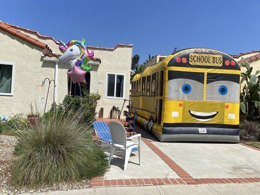 Bus bounce house.