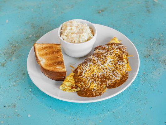 Detroit Omelet, made with 3 eggs, sautéed onions, shredded cheese & smothered in chili.