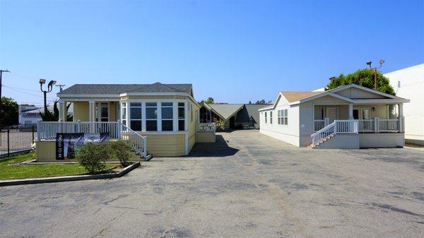 Our two model homes in front with our office in back.