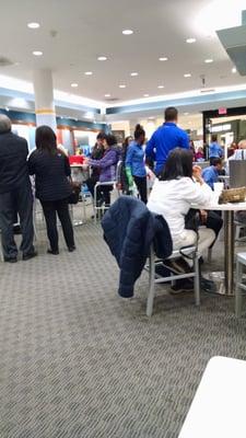 Toys-for-Tots Tuesdays: pray that your next visit to an actual airport lounge isn't this crowded.