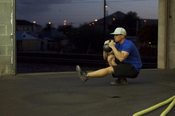 Personal trainer Keegan demonstrating the pistol squat